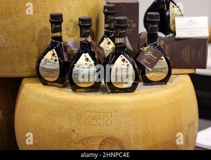 Whole wheel of Parmigiano Reggiano cheese and balsamic vinegar Stock Photo