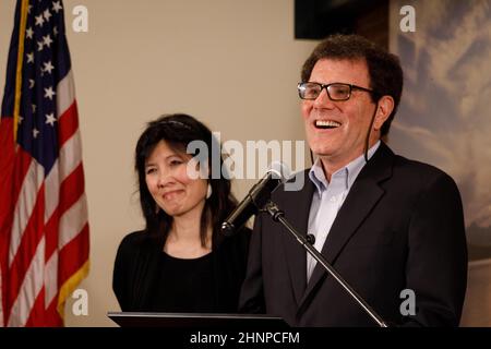 Portland, USA. 17th Feb, 2022. Nicholas Kristof, former New York Times reporter and columnist, and two-time Pulitzer prize winner, next to his wife Sheryl WuDunn, announces on February 17, 2022, in Portland, Oregon, the end of his bid for the governorship of Oregon, after his residency status was denied today by the Oregon Supreme Court. (Photo by John Rudoff/Sipa USA) Credit: Sipa USA/Alamy Live News Stock Photo