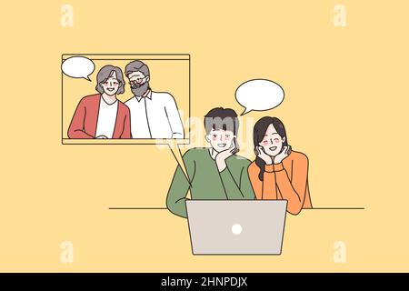 Happy couple talk on video call with parents Stock Photo