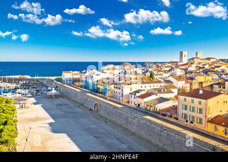 Town of Antibes historic walls and architecture view, famous destination in Cote d Azur, Southern France Stock Photo