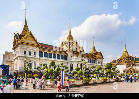 people visit Chakri Maha Prasat in Grand Palace Stock Photo