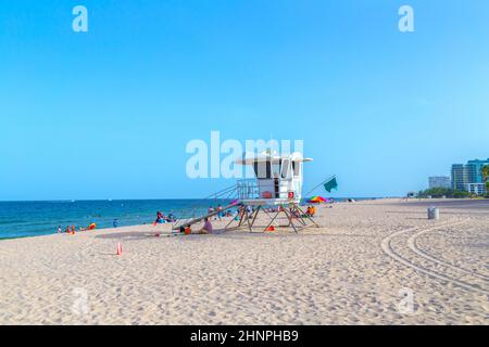 people relax at Beach with lifeguard station at Fort Lauderdale, Florida Stock Photo