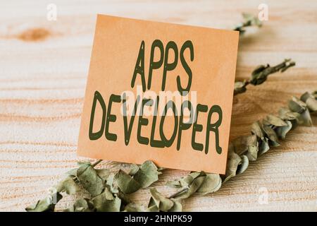 Text showing inspiration Apps Developer, Business idea Graphic artist Software Programmer and Analyst Experts Piece Of Blank Square Note Surrounded By Stock Photo