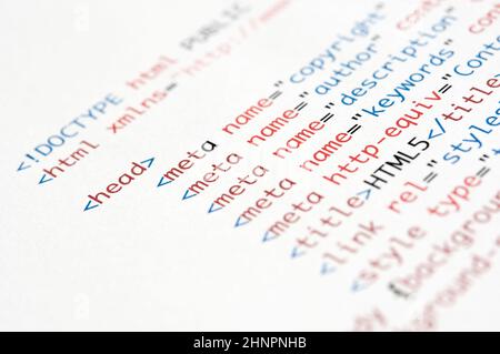 HTML script printed on white paper with shallow depth of field Stock Photo