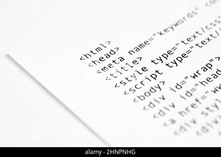 HTML script printed on white paper with shallow depth of field Stock Photo