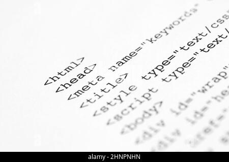 HTML script printed on white paper with shallow depth of field Stock Photo
