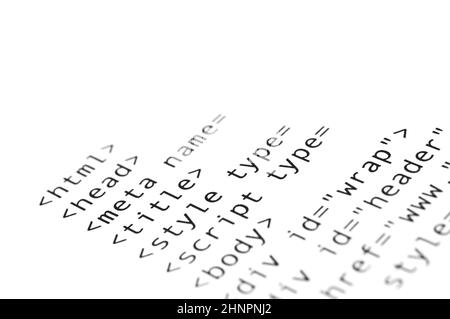 HTML script printed on white paper with shallow depth of field Stock Photo