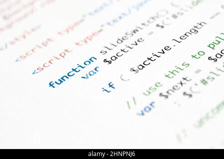 HTML script printed on white paper with shallow depth of field Stock Photo