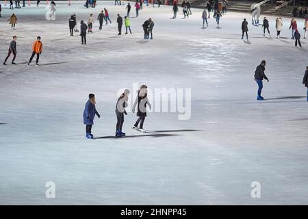 People skating on the ice rink in Budapest Stock Photo