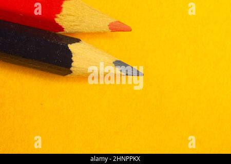 Colorful pencils isolated on yellow background. drawing supplies Stock Photo