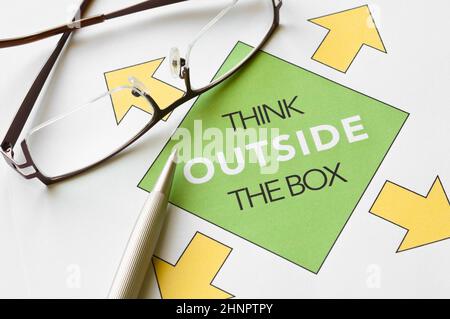 Think outside the box concept graph printed on white paper Stock Photo