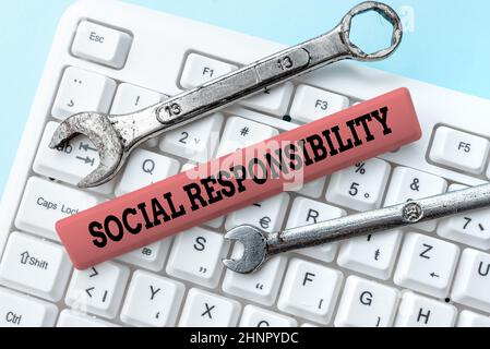 Handwriting text Social Responsibility. Word for Obligation for the Benefit of Society Balance in life Downloading Online Files And Data, Uploading Programming Codes Stock Photo