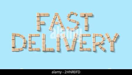Fast delivery from cardboard boxes on a blue background. Stock Photo