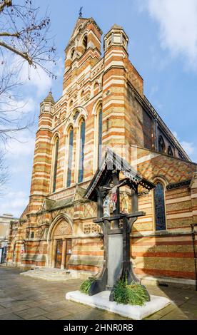 Crucufux outside Holy Trinity Brompton church, or St Augustine's, HTB Queen's Gate, 117 Queen's Gate, South Kensington, London SW7 Stock Photo