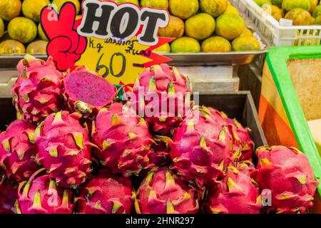 Pitaya pink dragonfruit Thai night market street food Bangkok Thailand. Stock Photo