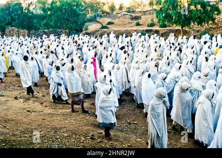 people watch the ceremony of a priest carries the holy ark in a ceremony through the streets Stock Photo