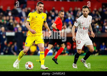 BUDAPEST, HUNGARY - AUGUST 13: (l-r) Tokmac Chol Nguen of Ferencvarosi TC  wins the ball from Arijan Ademi of GNK Dinamo Zagreb during the UEFA  Champions League Third Qualifying Round match between