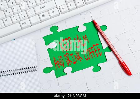 Inspiration showing sign Keep Calm And Drink Coffee, Word Written on encourage person to enjoy caffeine drink and relax Building An Unfinished White J Stock Photo