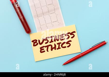 Text sign showing Business Ethics. Business overview Moral principles that guide the way a business behaves Reading Graph And Writing Important Medical Notes Test Result Analysis Stock Photo