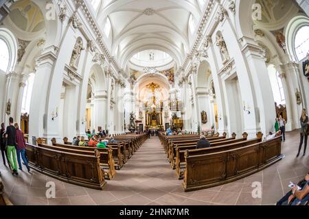 people inside of baroque Cathedral in Fulda Stock Photo