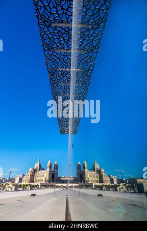 The modern building of Museum of European and Mediterranean Civilizations with reflection Stock Photo