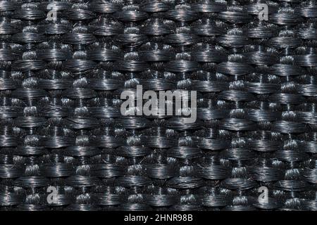 Plastic fiber weave texture. wickerwork material close up background Stock Photo