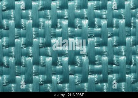 Plastic fiber weave texture. wickerwork material close up background Stock Photo