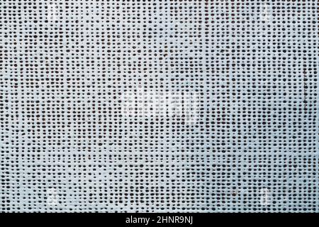 Rubber surface with uneven holes. white plastic texture with dots. abstract background Stock Photo