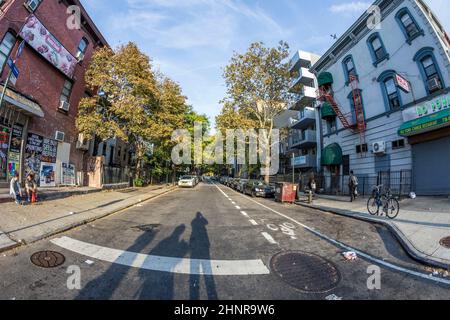 typical street scene with people in early morning in New York, Brooklyn Stock Photo