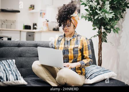 businesswoman working from home with her laptop Stock Photo