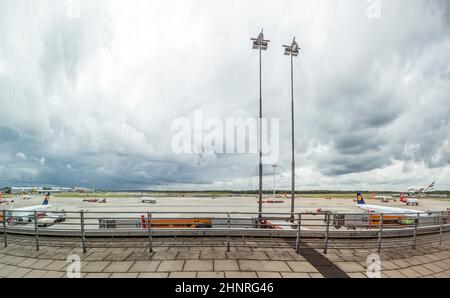 view to apron at the gate in Terminal 2 in Hamburg, Germany. Terminal 2 was completed in 1993 and houses Lufthansa and other Star Alliance partners Stock Photo