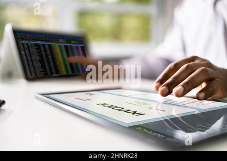 Invoice Accounting Software On Computer. Digital Business Bill Stock Photo