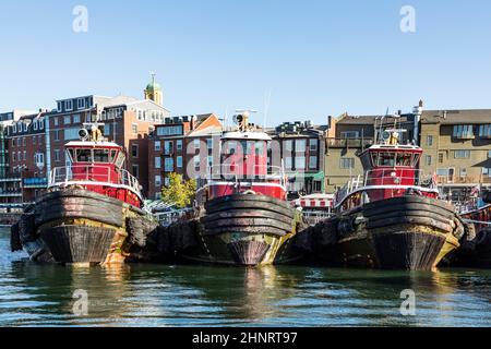 Boats docked in harbor in front of distant Cathedral of St. Euphemia ...