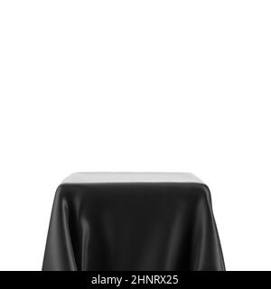 Empty spotlight pedestal covered with black cloth isolated on white background Stock Photo