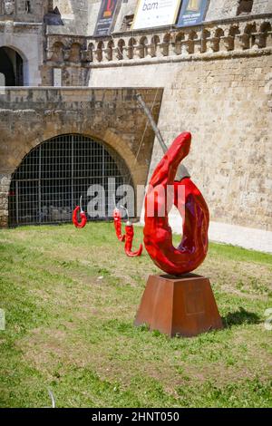 Castello Normanno Svevo Castle of Bari and art installation with red chili peppers Stock Photo