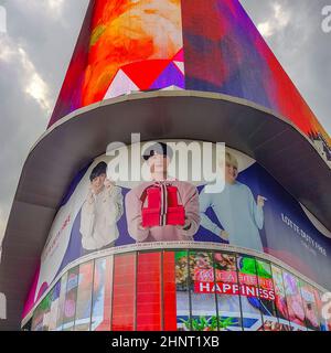 Huge colorful screens at the shopping center building Bangkok Thailand. Stock Photo