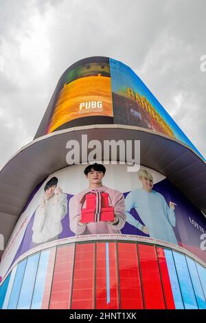 Huge colorful screens at the shopping center building Bangkok Thailand. Stock Photo