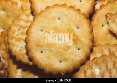 Round crackers background. crispy cookies. pile of biscuits Stock Photo