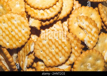 Round crackers background. crispy cookies. pile of biscuits Stock Photo