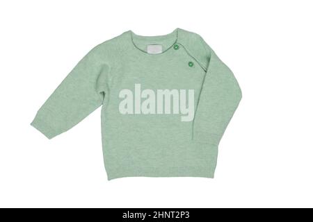Autumn and winter children clothes. A light green cozy warm sweater or pullover isolated on a white background. Spring fashion for child boy. Stock Photo
