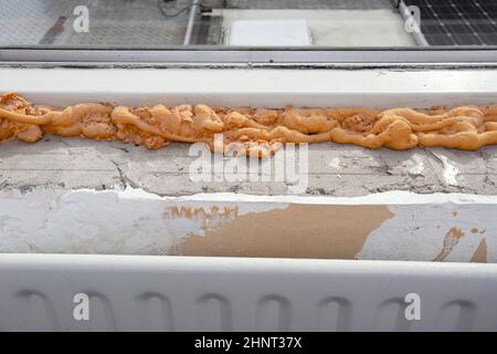 Worker is using a polyurethane foam for installation of window sill Stock  Photo - Alamy