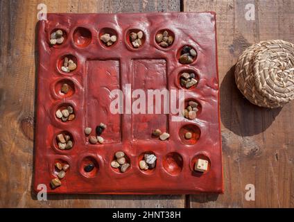 Reconstruction of roman board game Tabula Lusoria. Private recreational activity of ancient romans Stock Photo