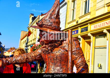 Living statue of witch. Live statue of sorceress. Stock Photo