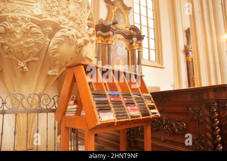 Hymn books for prayers in church. The bibles and hymnals Stock Photo