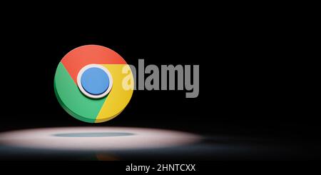 Google Chrome Logo Spotlighted on Black Background Stock Photo