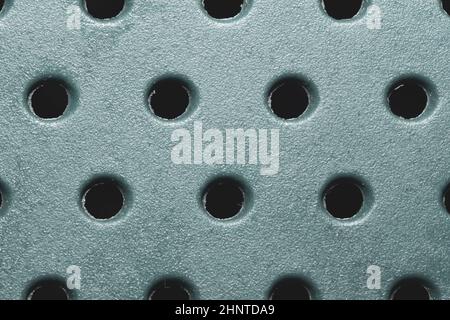 Holes in plastic surface. abstract pattern background Stock Photo