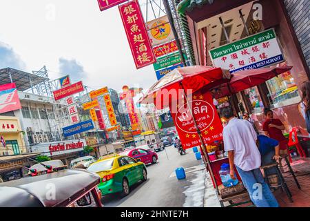 Heavy traffic in China Town on Yaowarat Road Bangkok Thailand. Stock Photo