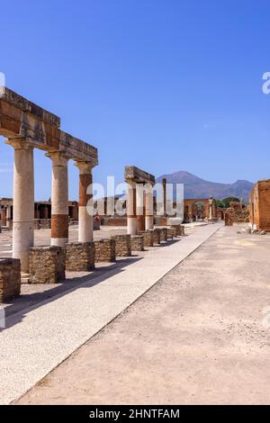 Forum of city destroyed by the eruption of the volcano Vesuvius, view of mount Vesuvius, Pompeii, Naples, Italy Stock Photo