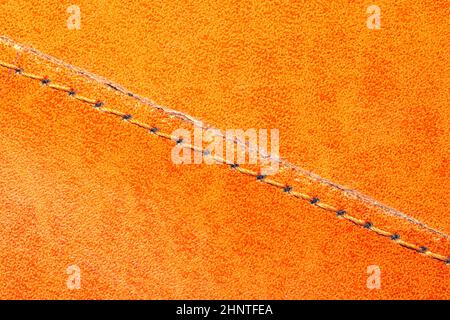 Brown leather texture with a linear stitch. material with seam Stock Photo