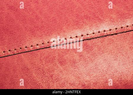 Brown leather texture with a linear stitch. material with seam Stock Photo